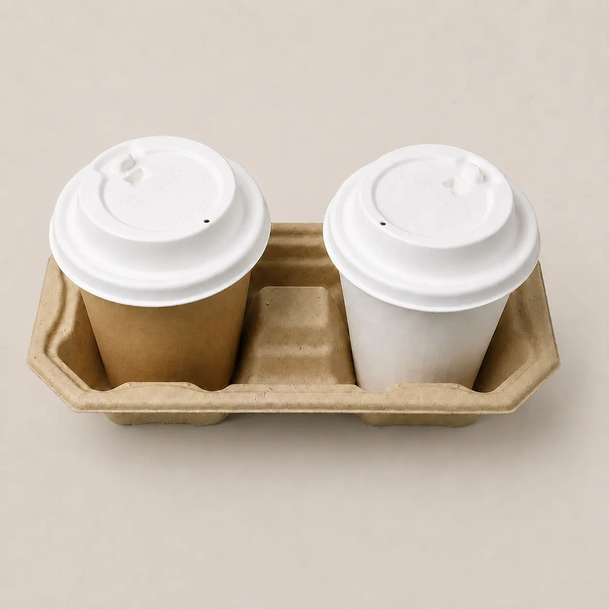 80mm Flip-Top Molded Fiber Hot Cup Lid in Café Use White 80mm flip-top molded fiber hot cup lids fitted to takeaway cups in a molded fiber drink carrier