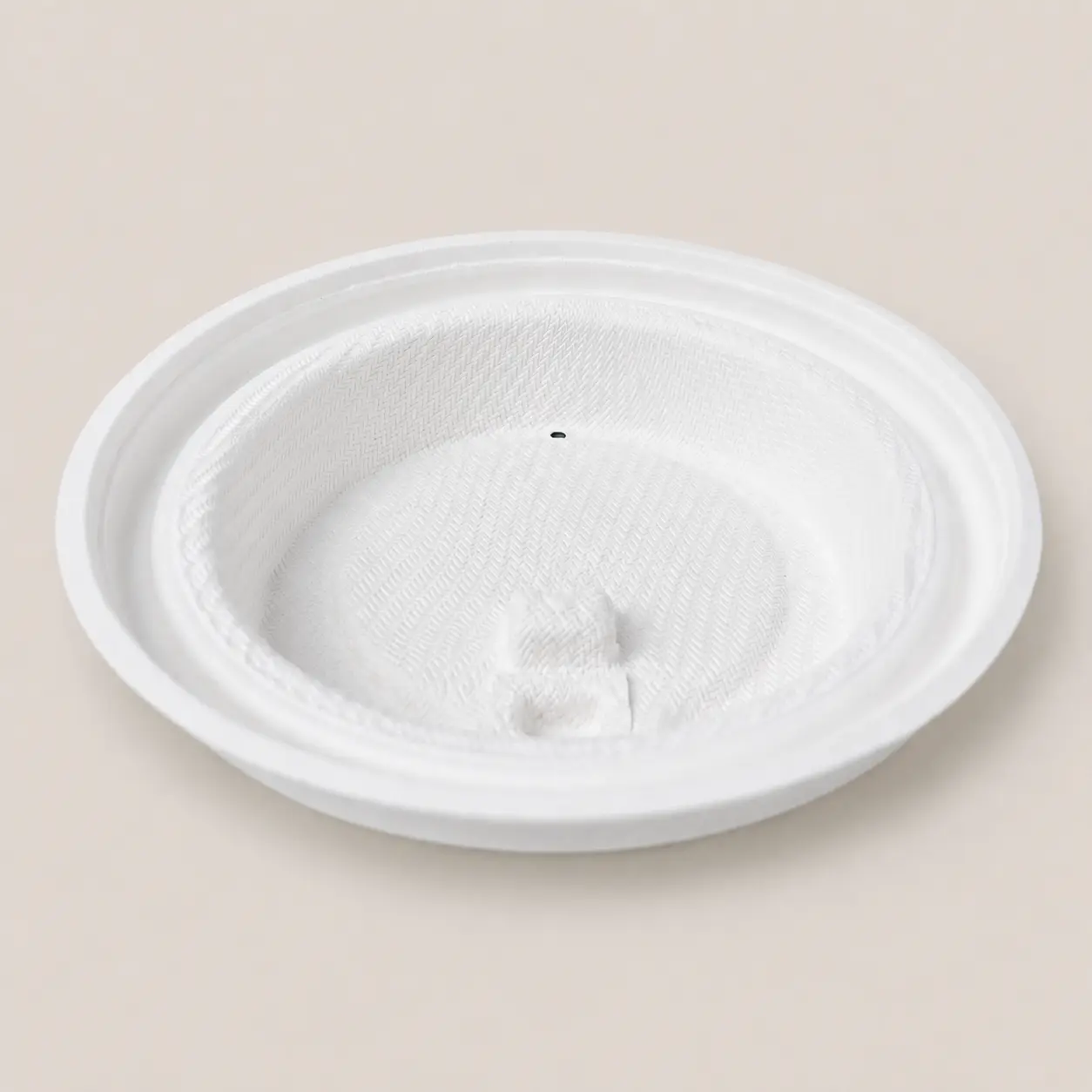 80mm-flip-top-molded-fiber-hot-cup-lid-underside.webp Underside view of a white 80mm flip-top molded fiber hot cup lid showing its molded rim and inner structure