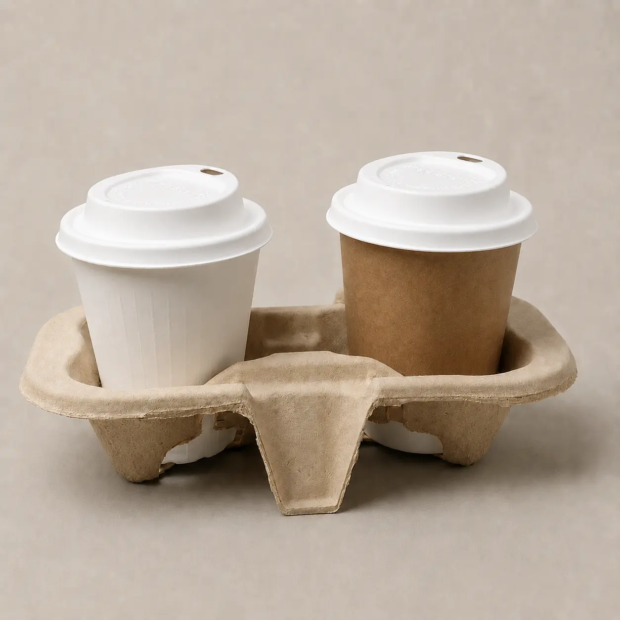 80mm Triangle-Design Molded Fiber Hot Cup Lid in Two-Cup Carrier White 80mm triangle-design molded fiber hot cup lids fitted to two takeaway cups in a molded fiber drink carrier