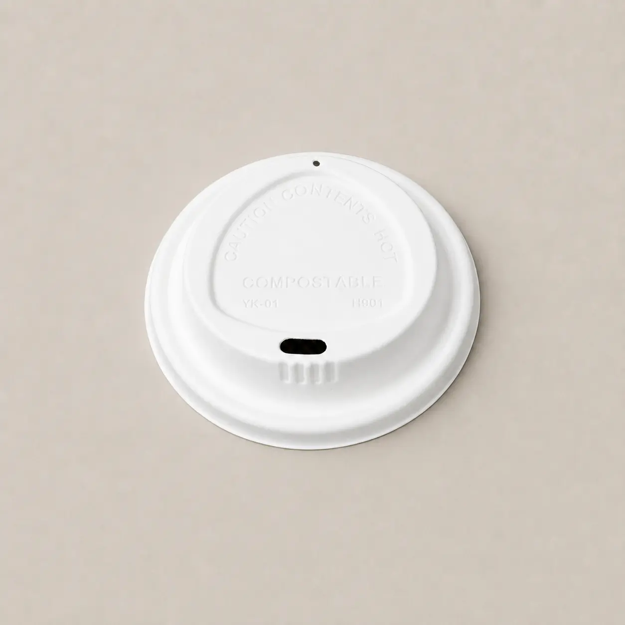 90mm Triangle-Design Molded Fiber Hot Cup Lid Top View Top view of a white 90mm triangle-design molded fiber hot cup lid with a direct-drink opening and separate vent hole