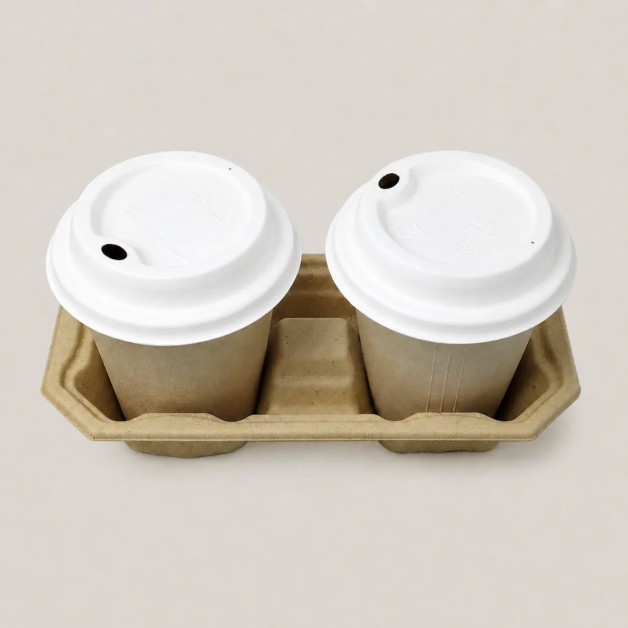 90mm Molded Fiber Hot Cup Sip Lids in Two-Cup Carrier Two takeaway cups fitted with white 90mm molded fiber hot cup sip lids in a molded fiber two-cup drink carrier