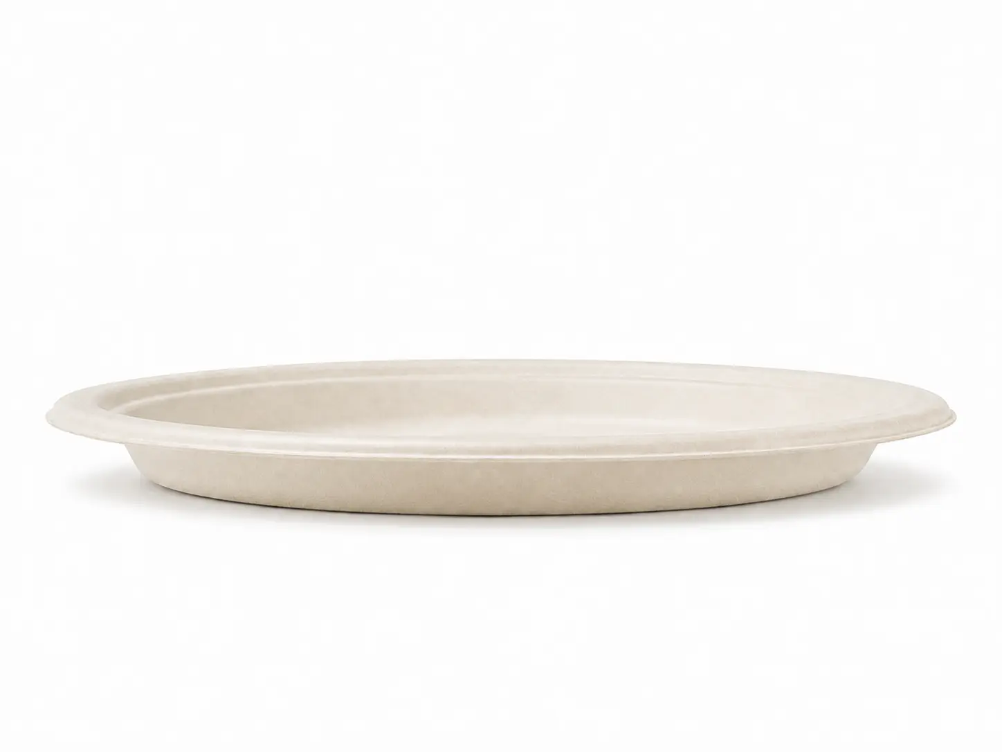 10-Inch Sugarcane Bagasse Round Plate Side Profile Low side view of a natural-color 10-Inch Sugarcane Bagasse Round Plate showing its shallow depth, raised rim, and molded fiber edge