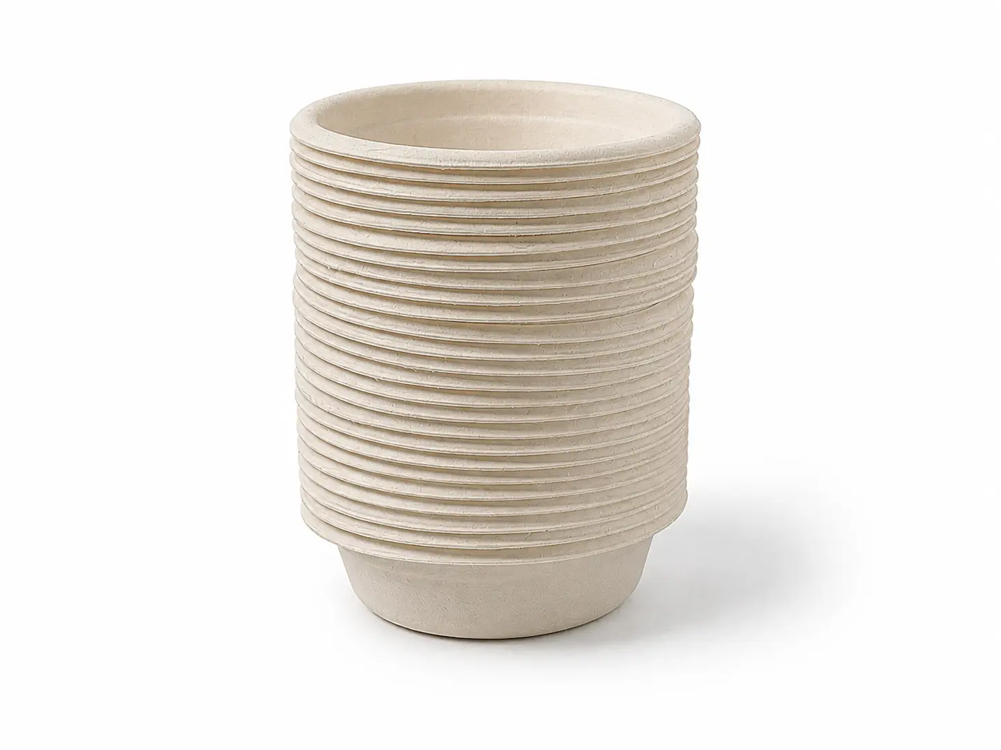 1oz Molded Fiber Sauce Cup Nested Stack Closely nested stack of natural-color 1oz Molded Fiber Sauce Cups showing uniform rims, compact stacking, and the top cup opening