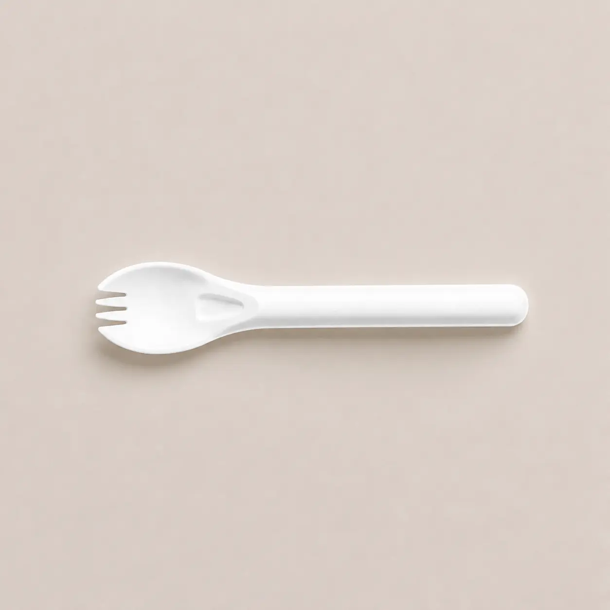 6-Inch Molded Fiber Spork Horizontal Top View Horizontal top view of a white 6-Inch Molded Fiber Spork showing four short tines, a reinforced neck, and a rounded handle end