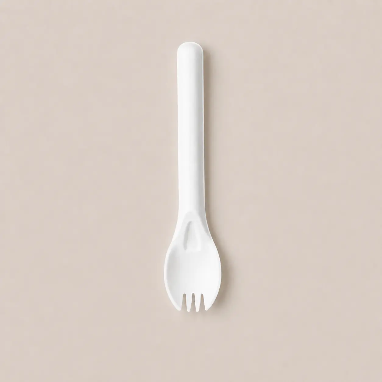 6-Inch Molded Fiber Spork Vertical Top View Vertical top view of a white 6-Inch Molded Fiber Spork with its rounded handle, reinforced neck, and four short tines visible
