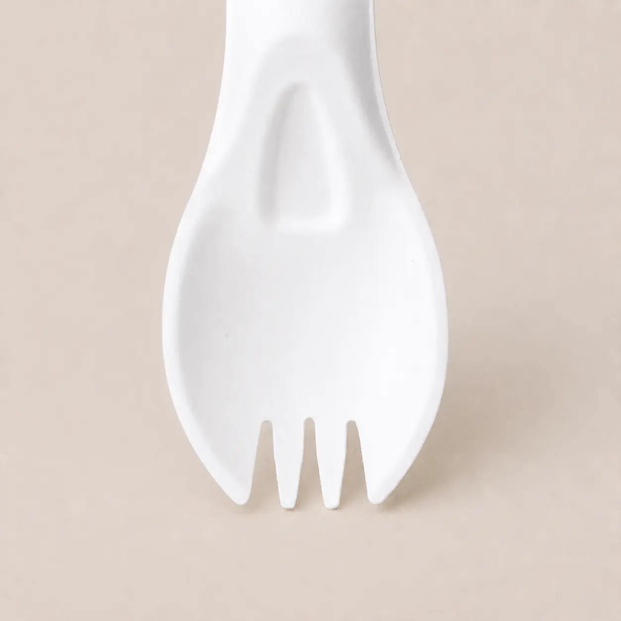 6-Inch Molded Fiber Spork Four-Tine Detail Close-up of the white 6-Inch Molded Fiber Spork showing four short molded tines and reinforcement near the handle transition