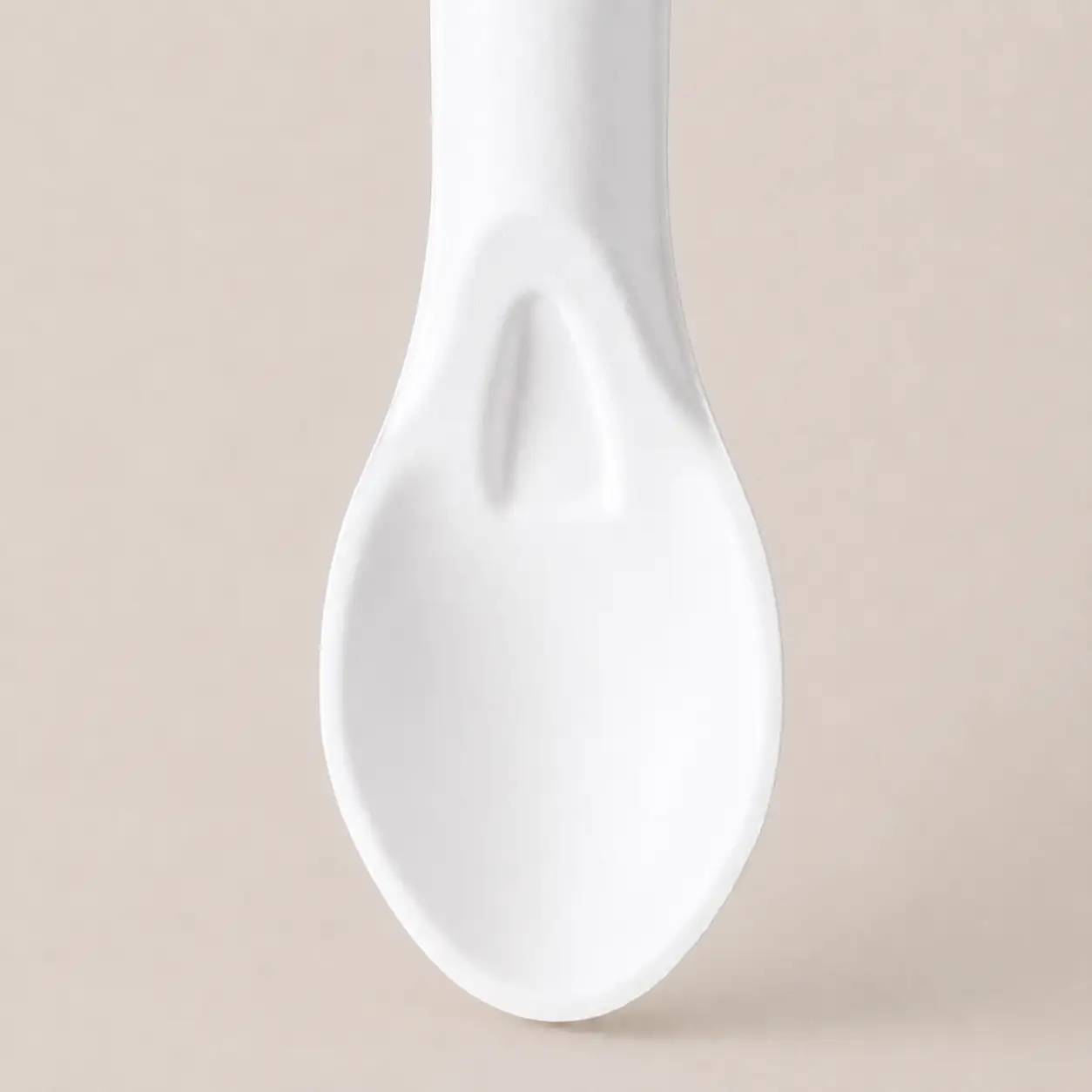6-Inch Molded Fiber Spoon KPS-02 Serving-End Detail Close-up of a white 6-Inch Molded Fiber Spoon KPS-02 showing its concave serving surface and molded neck detail